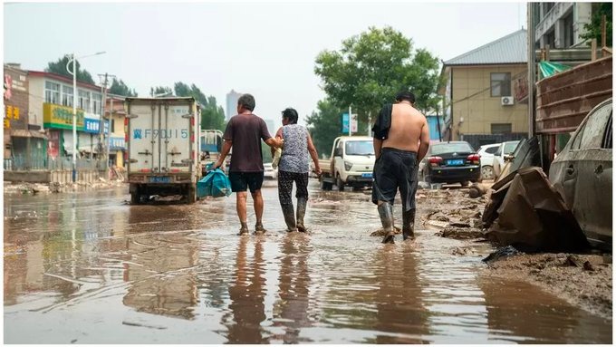 Houses floating away in flash flood in China; 10,000 people missing in Libya floods