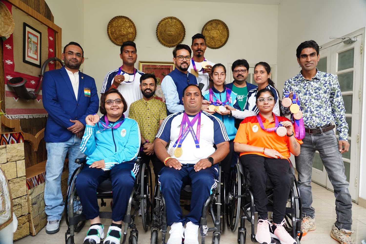 Union Sports Minister Anurag Thakur interacts with medallists of Asian Para Games 2023