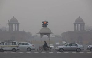 Delhi resumes some activities despite hazardous air, river foam
