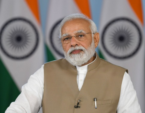 PM Modi guarantees timely implementation of flagship schemes for Adivasis