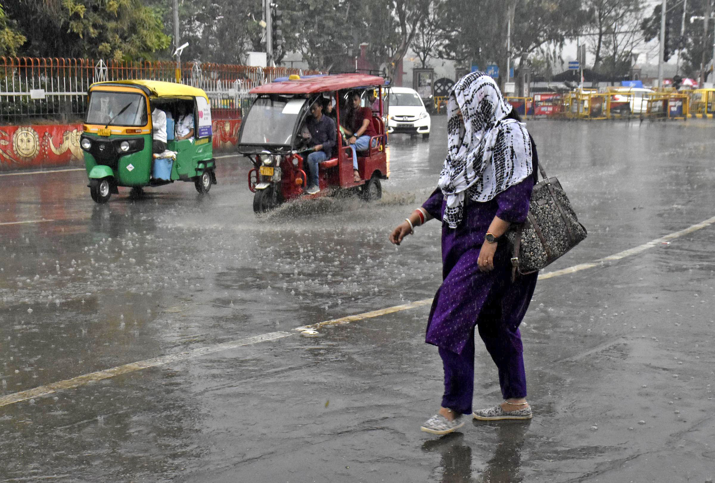 Sudden rainfall with strong winds bring respite from heat in Delhi