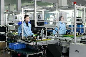 China's slow April factory, services activity dents economic momentum