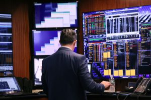 US STOCKS: Wall Street gains on Fed's dovish signals