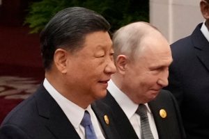 Putin and Xi wrap up talks with tea ceremony in a Beijing park