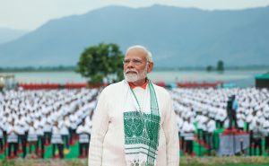 PM Modi adorns Assam's Gamosa at Yoga event in Srinagar, Union Minister Sarbananda Sonowal expresses gratitude