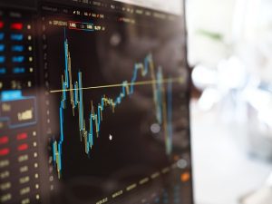 Stock markets begin week on a cautious note with key indices slipping into red