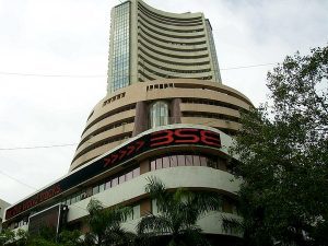Sensex, Nifty end flat amid volatile trading