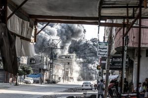 Israel launches new raids in Gaza as Netanyahu visits U.S.