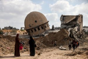 Israeli forces quit east Khan Younis, Palestinians recover dozens of bodies