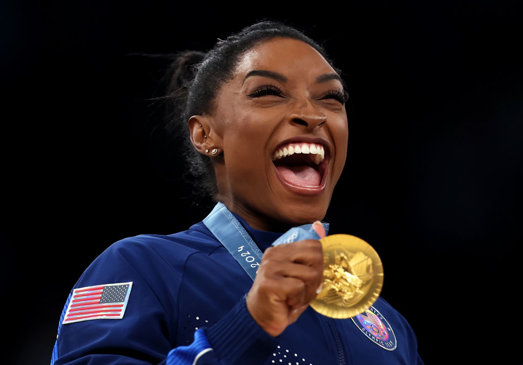 Biles stands head and shoulders above rivals after clinching all-around gold