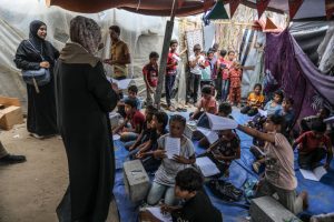 Gaza teacher offers ray of hope with classroom in rubble