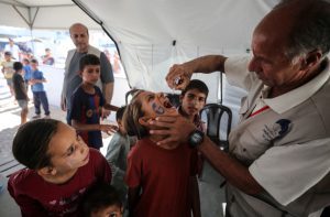 Palestinian children in south Gaza receive polio vaccinations amid continued war