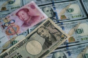 Oil slides on Mideast respite, yen down as Japan govt loses majority