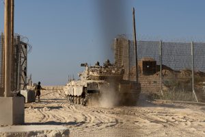 Israeli fire kills 11 Palestinians as tanks roll into central Gaza camp