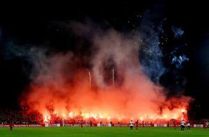 Bayern Munich fined 150,000 euros after fans disrupt Cup game with flares, fireworks