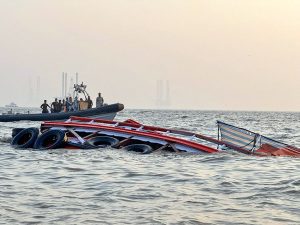 Divers, helicopters hunt survivors of Mumbai boat accident that killed 13