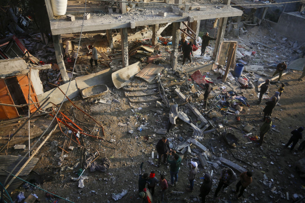 Israel kills at least 66 Palestinians in Gaza, strikes post office used as shelter