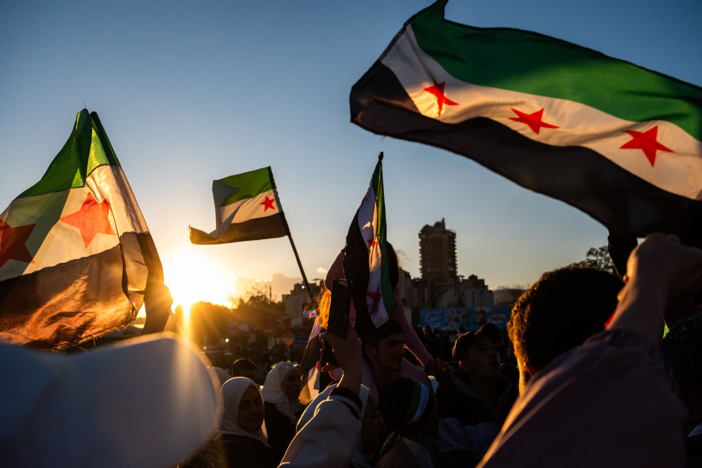 France returns flag to Damascus embassy as new Syria authorities build contacts with West