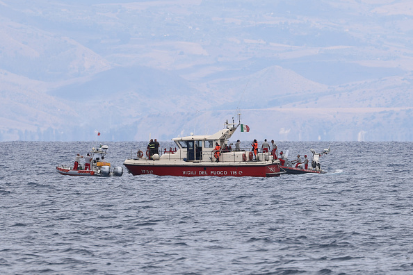 At least 20 migrants missing as boat sinks off Italy, seven rescued