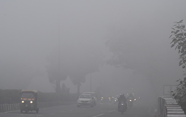 Delhi shrouded in fog, flight and train delays continue