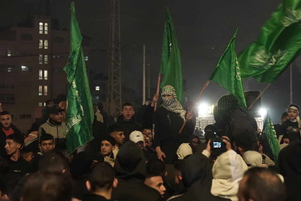 Palestinians wait for their relatives to be released within the hostage swap between Israel and Hamas, outside Ofer Prison in Beitunia, West Bank on January 19, 2025. Photo by Issam Rimawi/Anadolu via Getty Images