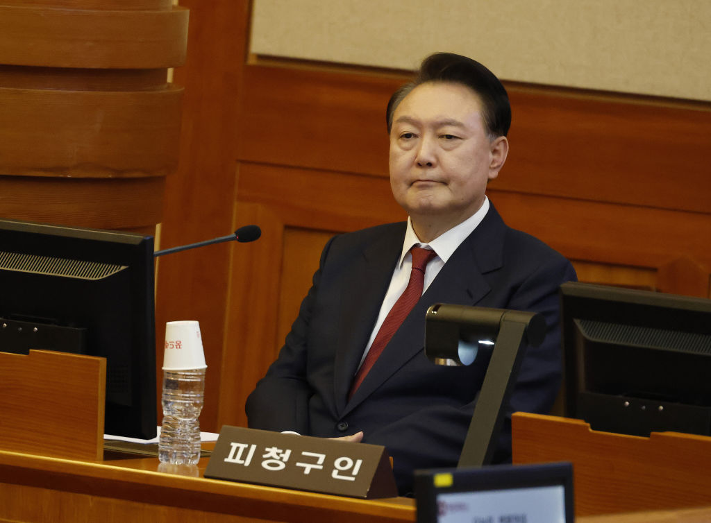 South Korea’s ex-leader Yoon Suk Yeol lay on floor of cell and refused to be questioned, prosecutors say