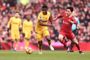 Liverpool edge past Wolves to go seven points clear at top