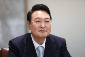 South Korea's President Yoon free, trials continue after court quashes detention