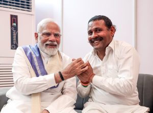 After 14 years barefoot, devoted admirer finally meets PM Modi