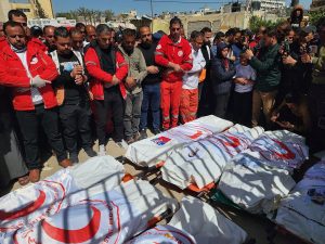 Bodies of 15 rescue workers recovered from grave in Gaza, UN officials say