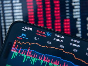 Asian shares fall as Nvidia hit by U.S. chips curbs, gold hits record