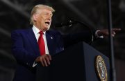 Trump touts economy at Michigan 100-day rally, as Americans grow wary