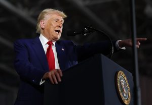 Trump touts economy at Michigan 100-day rally, as Americans grow wary