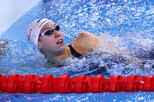 Swimming-Walsh breaks American record in 50m butterfly
