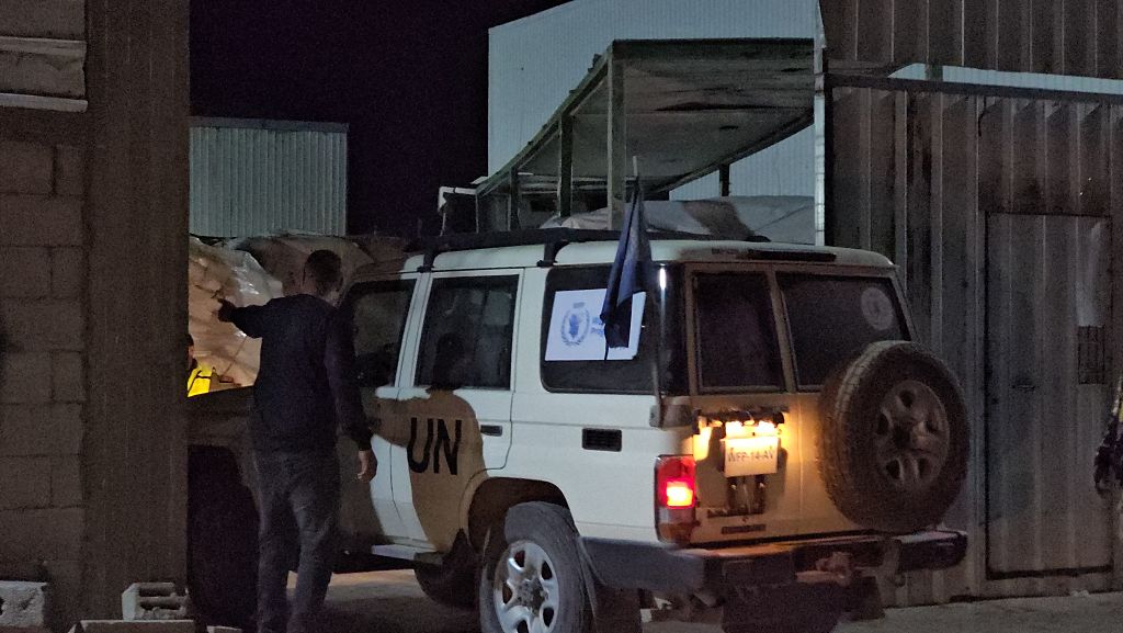 Aid trucks enter Gaza after delays, as pressure mounts on Israel