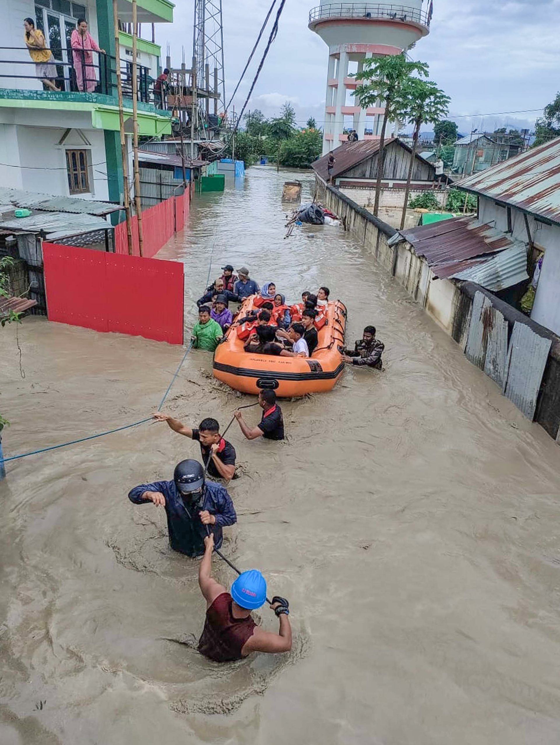 Security personnel rescue people stranded in floods in Northeastern states