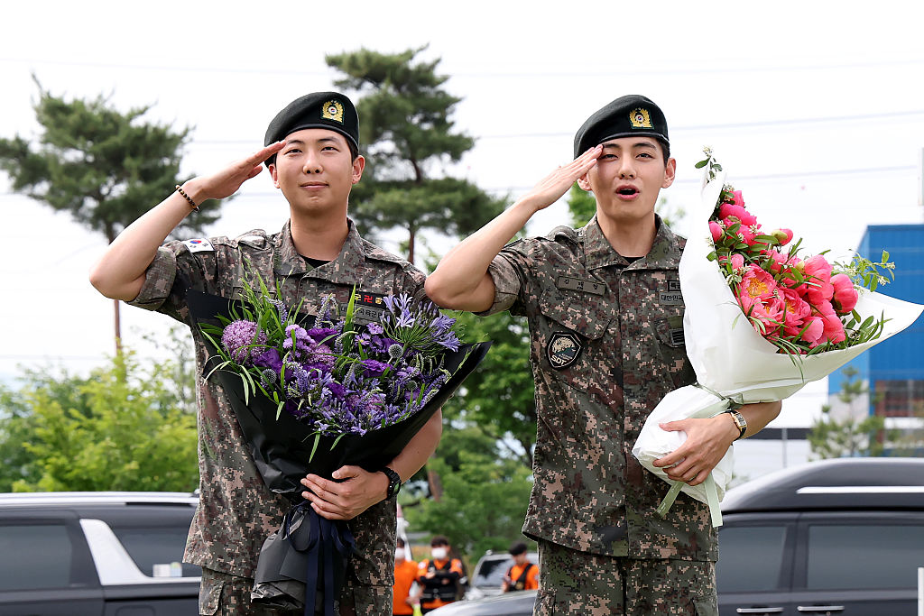 K-pop megastars RM, V released from army, promise BTS reunion