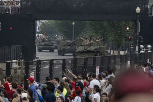 After day of nationwide protests, Trump's military parade rolls through D.C.