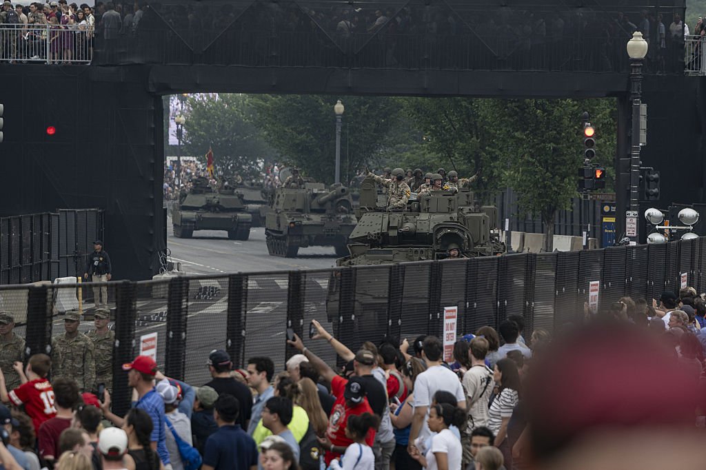 After day of nationwide protests, Trump’s military parade rolls through D.C.