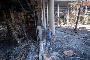Israel says it hit dozens of military targets in Iran, including nuclear research site