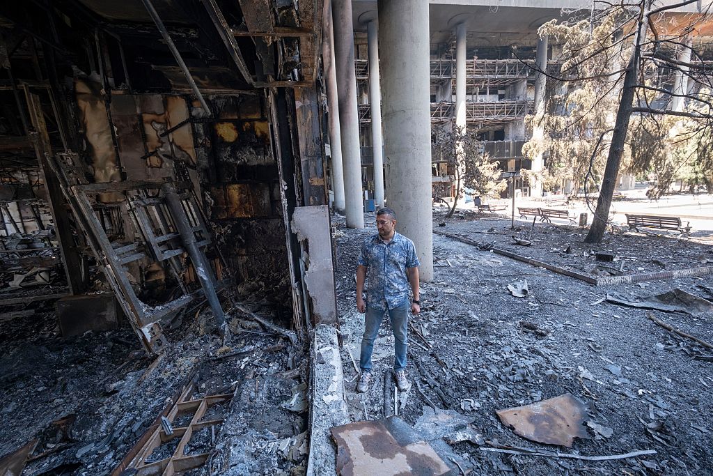 Israel says it hit dozens of military targets in Iran, including nuclear research site