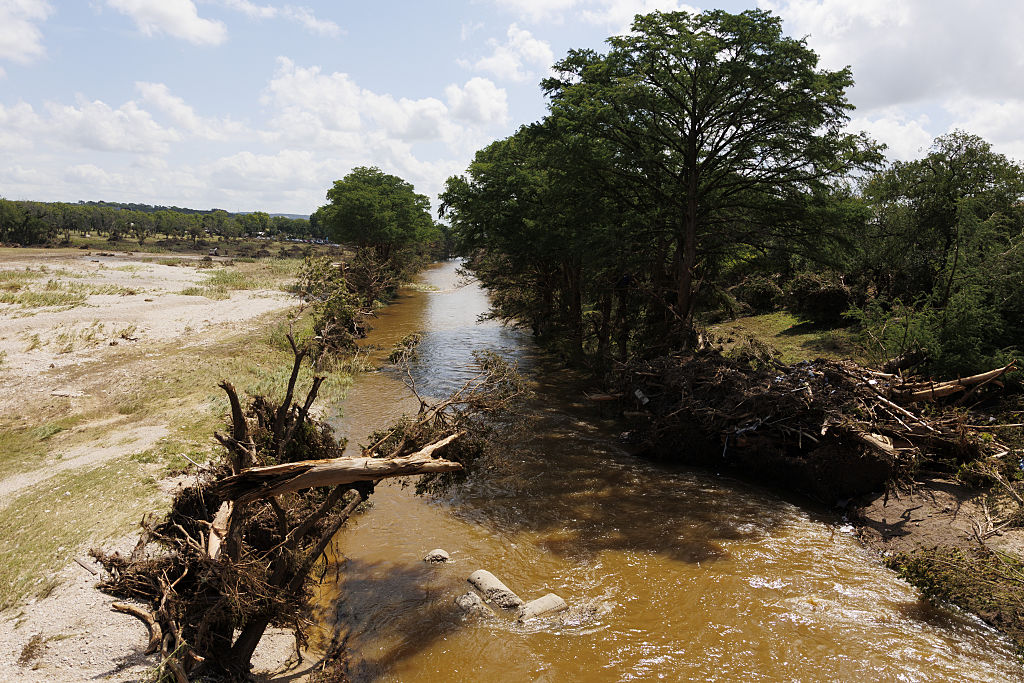 Flash floods in New Mexico resort town kills three, traps dozens in homes and vehicles