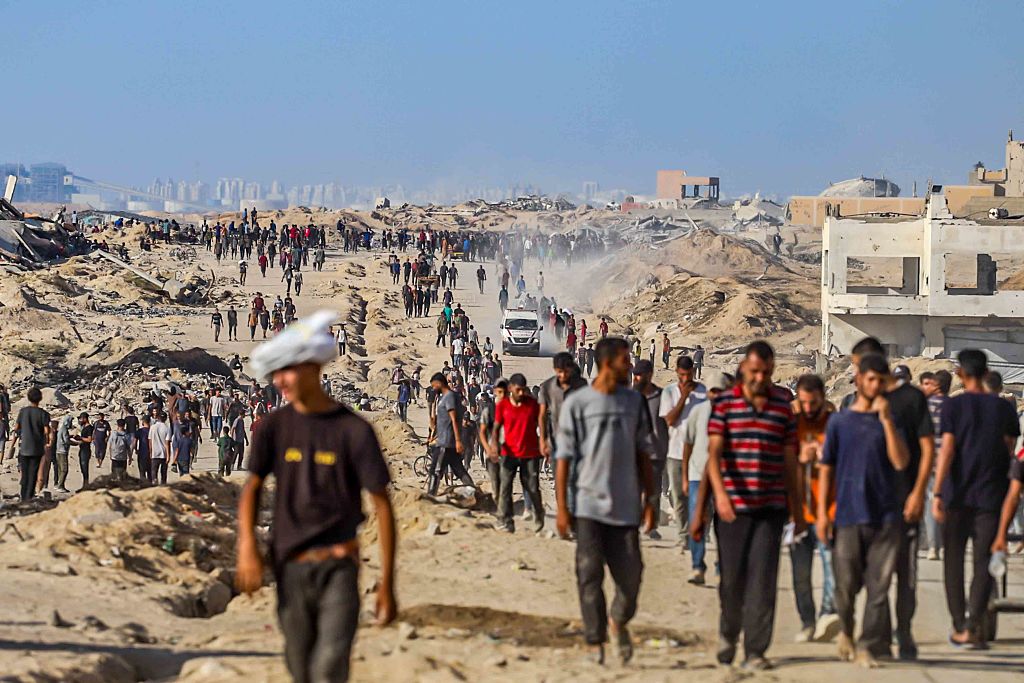 Gaza truce talks faltering over withdrawal; 17 reported killed in latest shooting near aid