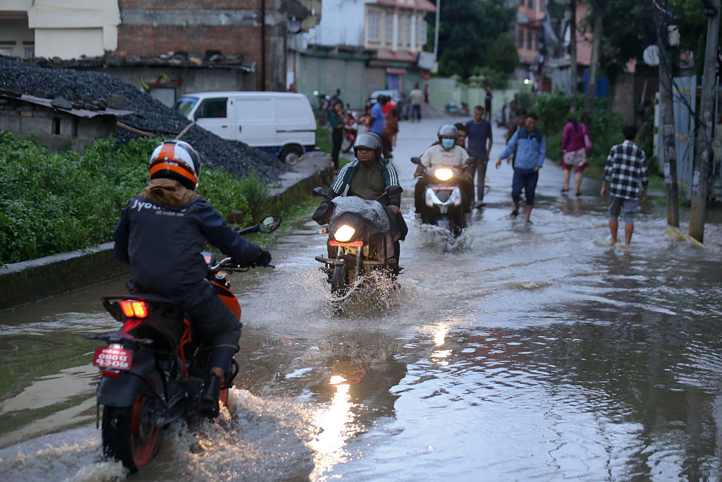 At least eight killed and dozens missing after floods on Nepal-China border