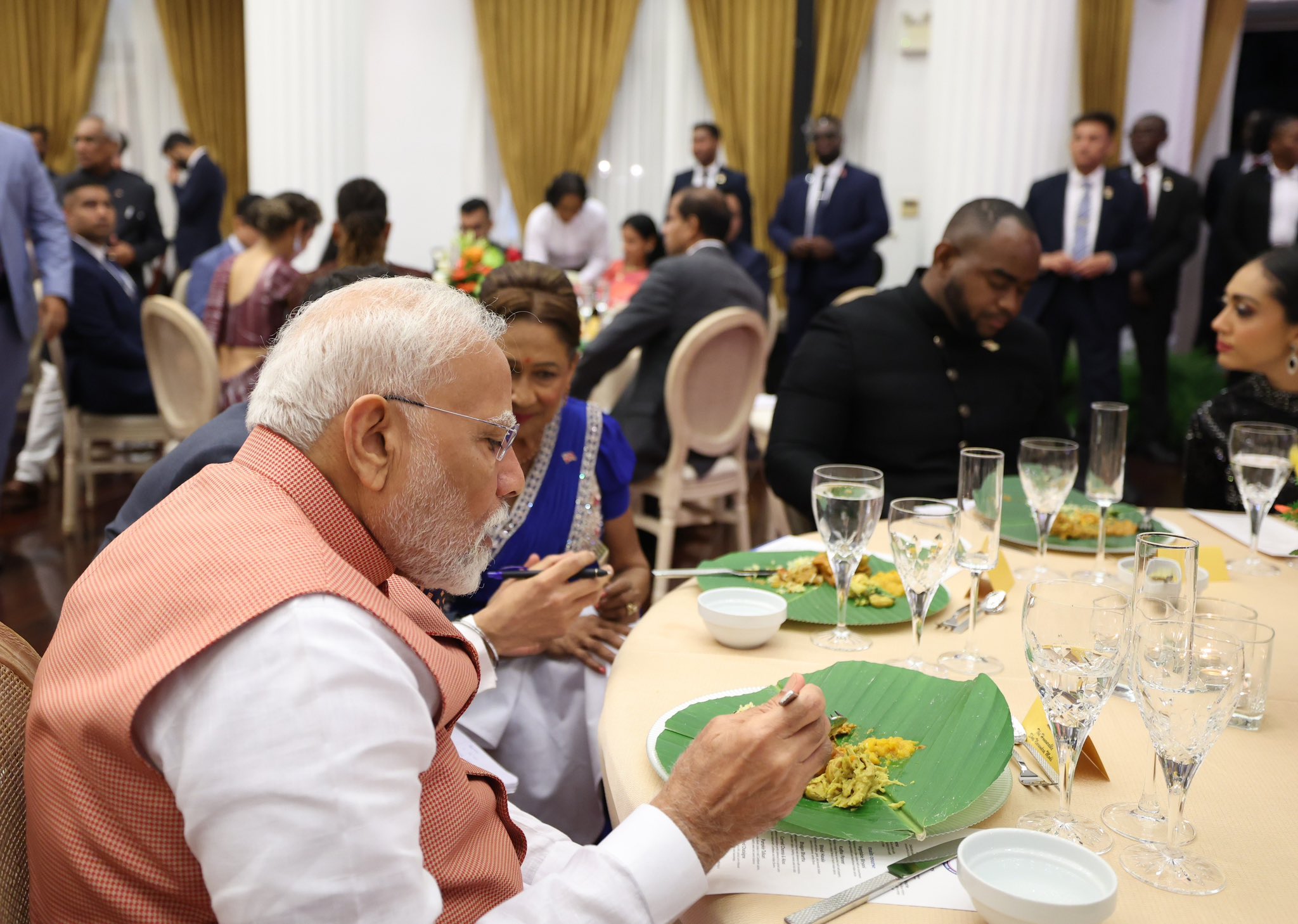 PM Modi attends traditional dinner hosted by Trinidad and Tobago Prime Minister