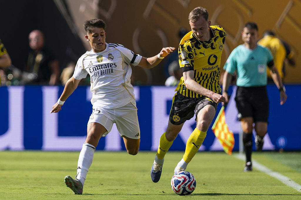 Real Madrid survive Dortmund scare to reach Club World Cup semis