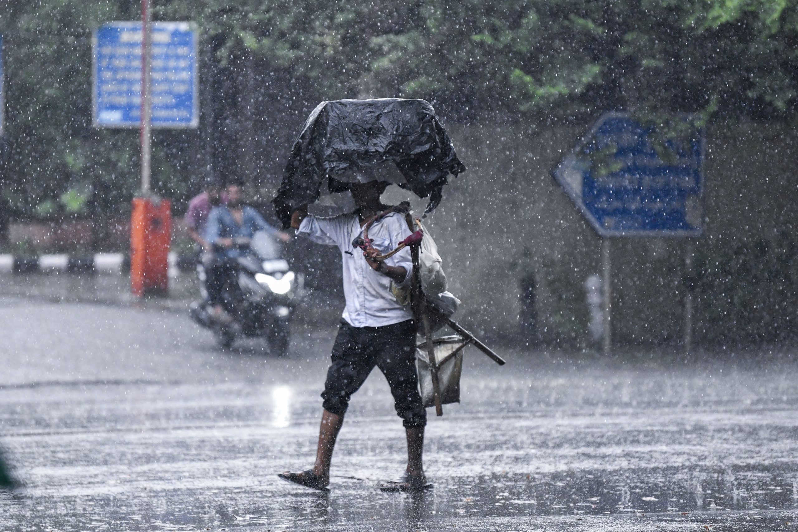 Heavy rains continue across eastern and southern India amid dual low-pressure systems; Delhi-NCR also gets drenched