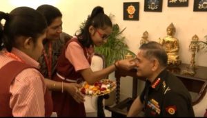 Schoolgirls tie 'rakhi' to Army Chief; military reaffirms pledge to protect country