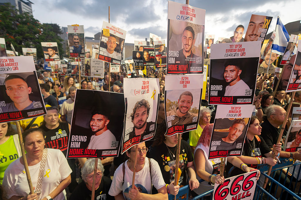Hamas says it will allow aid for hostages if Israel halts airstrikes, opens permanent humanitarian corridors