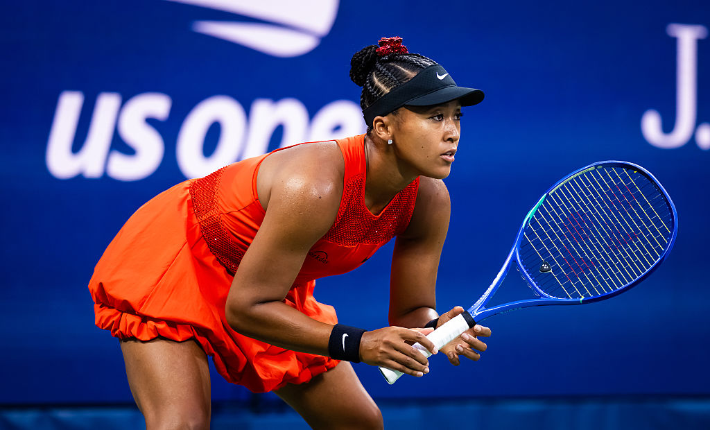 Resplendent in red, Osaka races into US Open second round